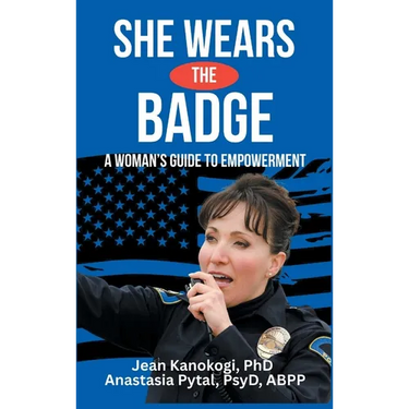 She Wears The Badge: A Woman's Guide to Empowerment