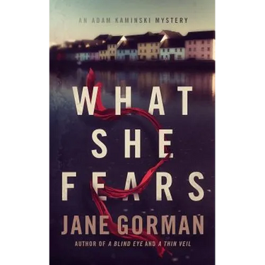 What She Fears: Book 4 in the Adam Kaminski Mystery Series