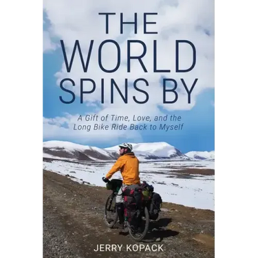 The World Spins By: A Gift of Time, Love, and the Long Bike Ride Back to Myself