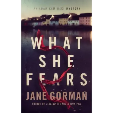 What She Fears: Book 4 in the Adam Kaminski Mystery Series