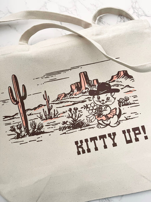 Kitty Up Cowgirl Cat Tote Bag by The Coin Laundry Print Shop