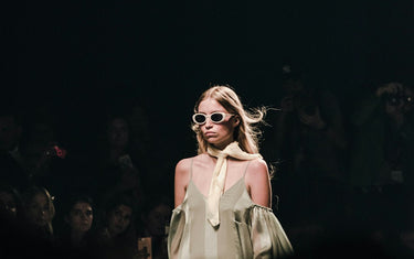 Unveiling the Magic: A Look Behind the Scenes at Fashion Week
