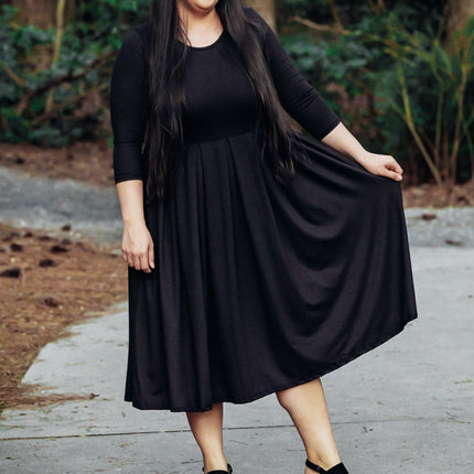 Pleated Fit And Flare Dress by Apostolic Clothing Company