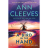 A Bird in the Hand: The First George & Molly Palmer-Jones Novel