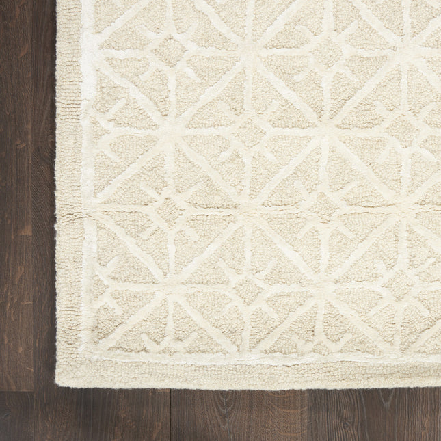 5' x 7' Brown and Ivory Geometric Hand Tufted Area Rug