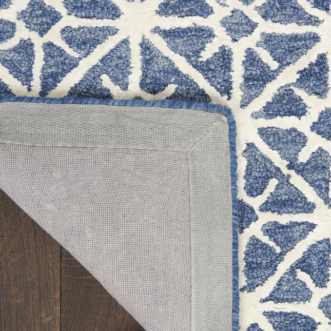 5' x 7' Blue and Off White Geometric Hand Tufted Area Rug