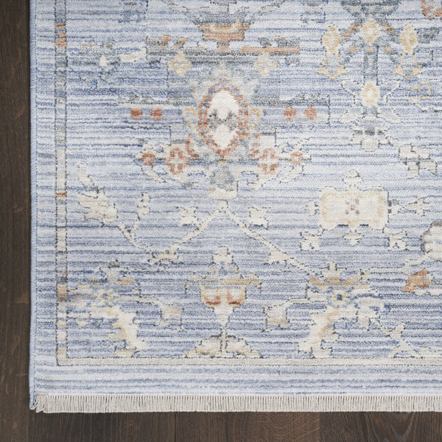 3' X 5' Blue and Ivory Oriental Power Loom Distressed Area Rug With Fringe