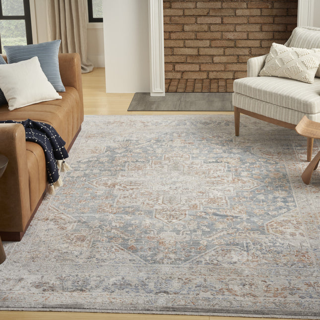 5' x 8' Ivory and Blue Oriental Power Loom Distressed Area Rug With Fringe