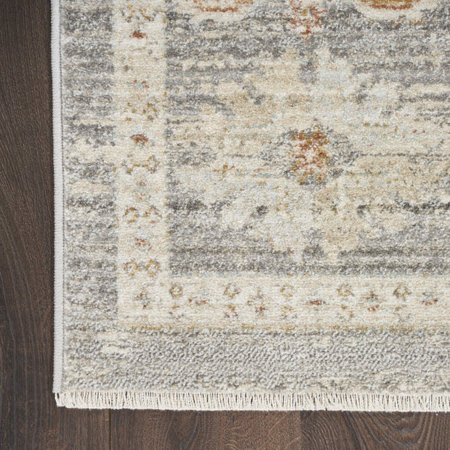 5' x 8' Beige Ivory and Gray Oriental Power Loom Distressed Area Rug With Fringe